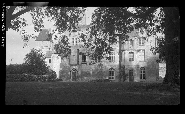 Photo:[Chateau de Creully, Creully, France. Exterior. View through trees]
