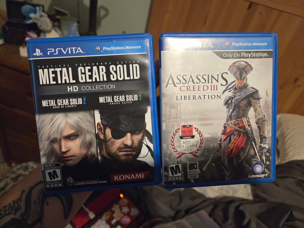 Lot of 2 Vita games - Assassin's Creed 3 and Metal Gear Solid