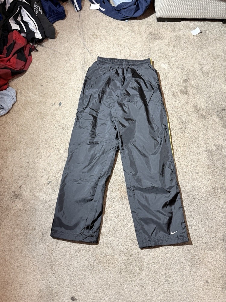 Y2K Nike Black track pants Size M red vintage Nike tag beautiful yellow stripe