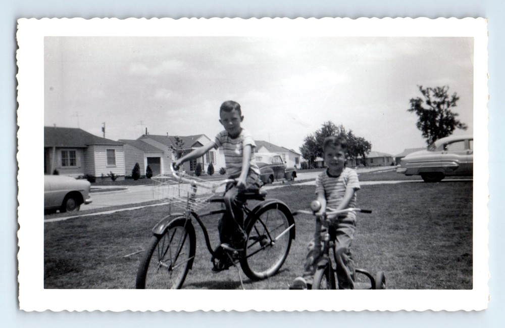 Old Vintage Photo PAIR BOYS RIDING BICYCLE IN YARD CLASSIC CARS SNAPSHOT