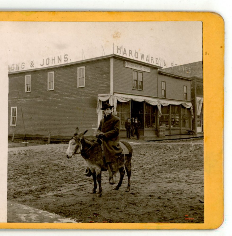 Ed Shriner on a Mule Main St. Spring Valley WI Stereoview 1904