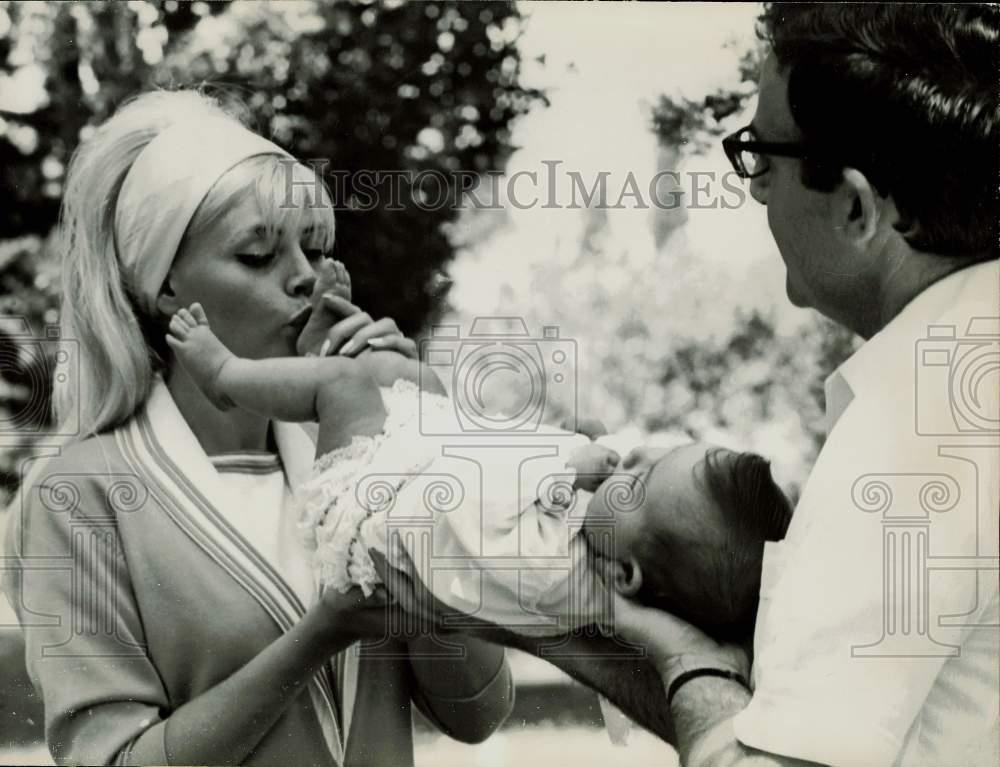 1966 Press Photo Peter Sellers, Britt Ekland play with daughter Victoria on set.
