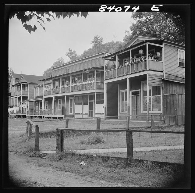 Photo:1930s Boarding House Porches Wooden Apartment Building Exterior