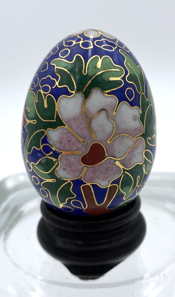 Vintage Japanese hand-painted porcelain egg with pink lotus on navy and wooden stand