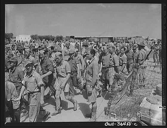 Photo:1940s WWII German POW Camp Prisoners Marching Crowd Photo