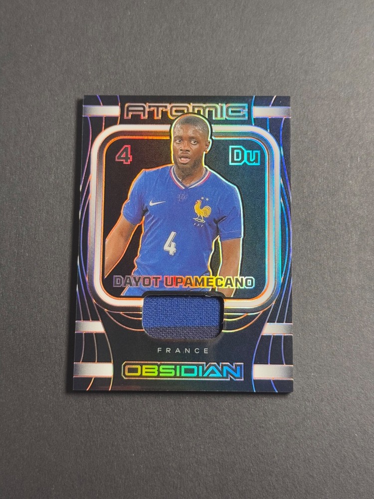 2023-24 Panini Obsidian Dayot Upamecano Atomic Material #AM-DUO /99 Orange