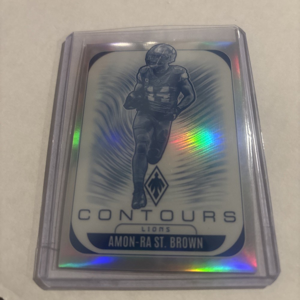 2025 Panini Phoenix - Contours Amon-Ra St. Brown #11