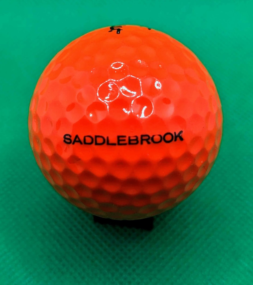 Vintage Orange Saddlebrook logo golf ball