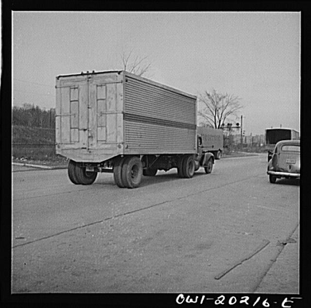 Photo:1930s Truck with Box Trailer on City Street Black and White Photo