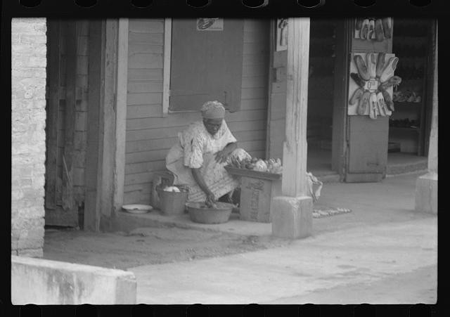 Photo:1930s Street Vendor Woman Storefront Porch Scene