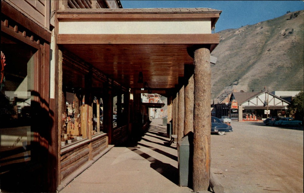 Rustic buildings Jackson Wyoming vintage cars ~ 1950-60s postcard
