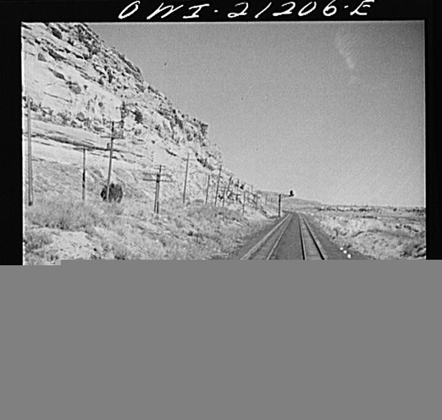 Photo:Railroad Tracks Desert Canyon 1900s Landscape Utility Poles