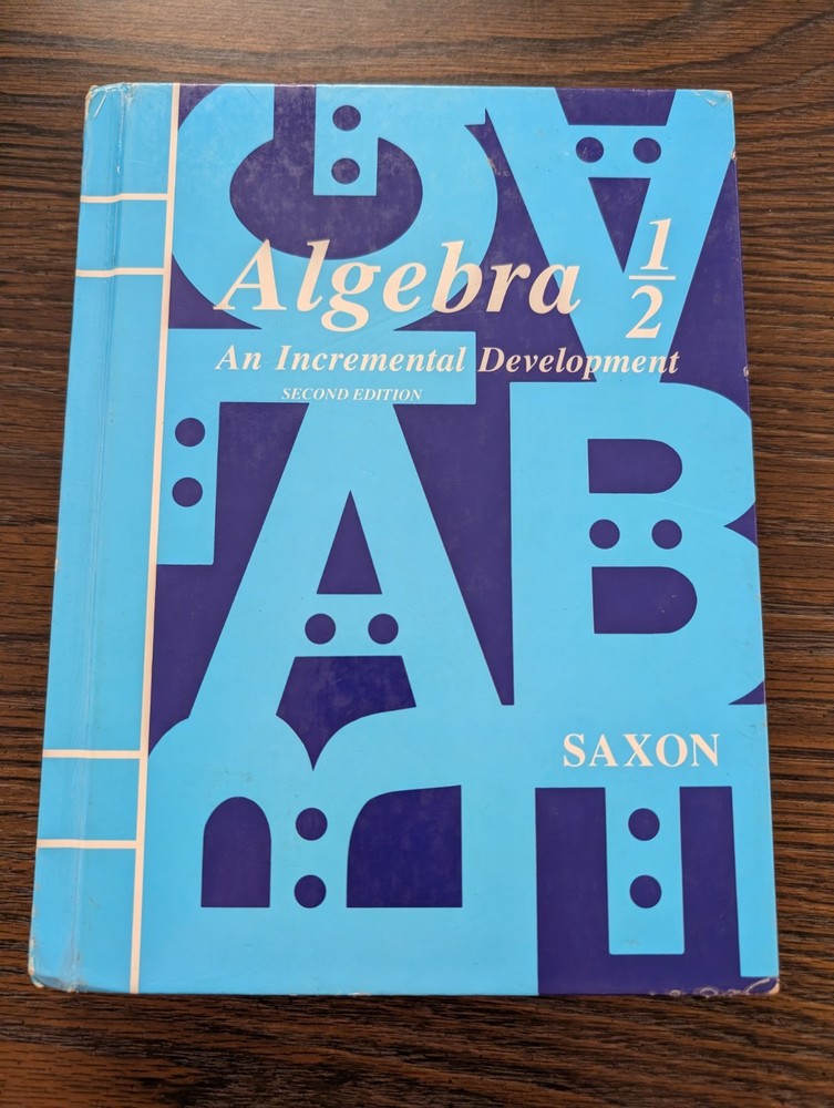 Saxon Algebra 1/2 - Second edition 1998 - answer key in back is stapled shut