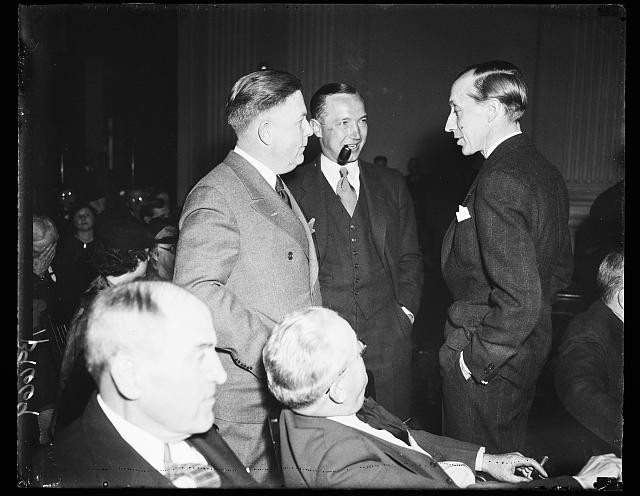 Photo:1936 Men in Suits Conversation Indoor Gathering Portrait