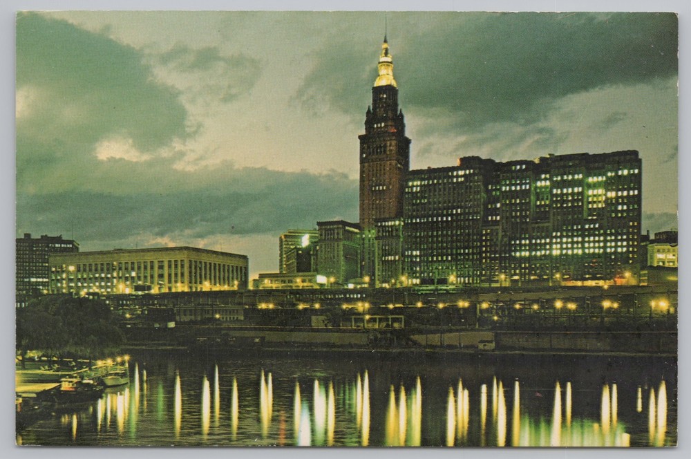 State View~Cleveland Ohio Skyline At Night From Cuyahoga River~Vintage Postcard