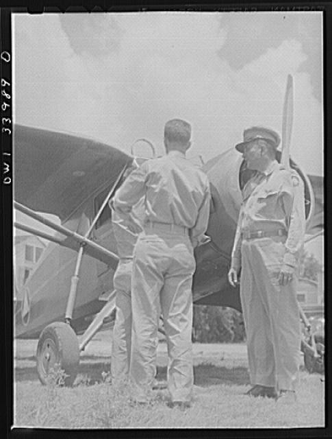 Photo:1940s Military Officers Beside Small Aircraft Airfield Scene