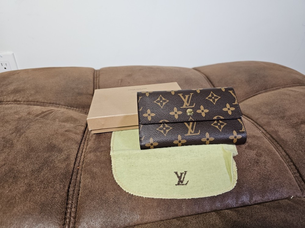 Authentic LOUIS VUITTON Monogram Porte Tresor International Trifold Wallet