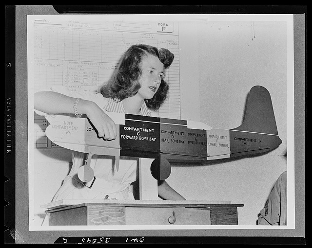 Photo:1940s Woman with B-17 Bomber Model Compartments Forward Bomb Bay