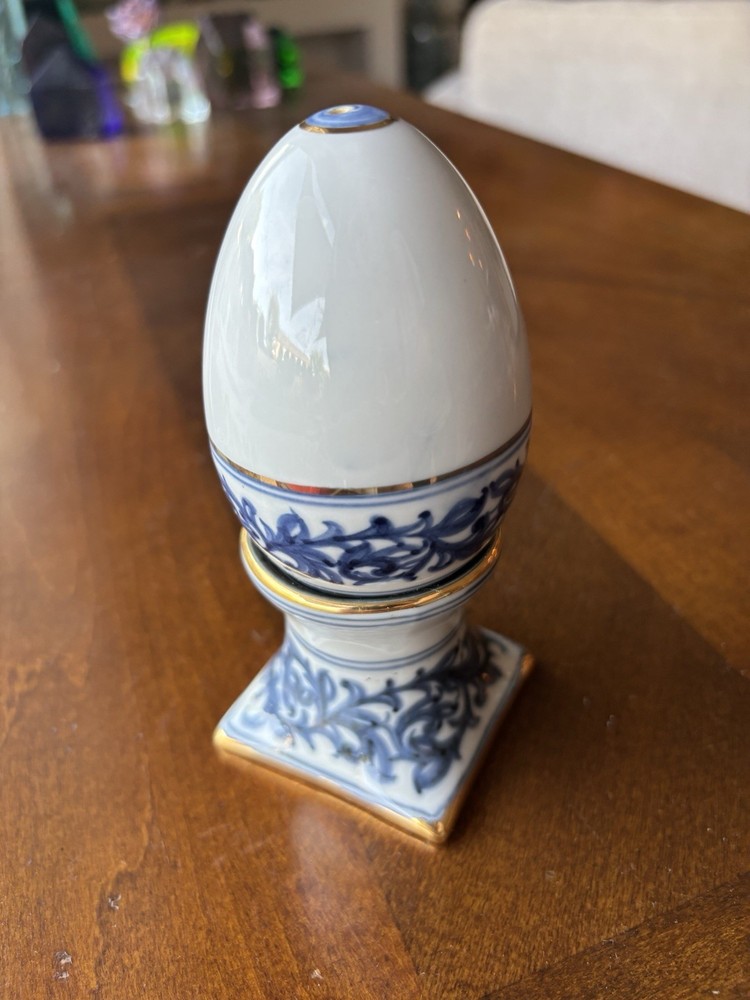 Vintage Blue and White Porcelain egg-shaped salt and pepper shaker on a stand