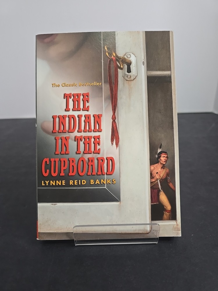 The Indian in the Cupboard by Lynne Reid Banks (First Yearling Ed. PB, 1981)...