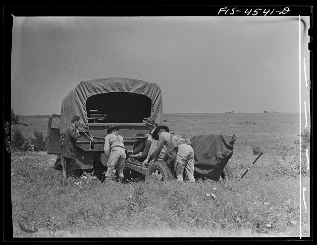 Photo:Fort Riley Kansas 1942 Field Artillery Crew Moving Gun to Camp