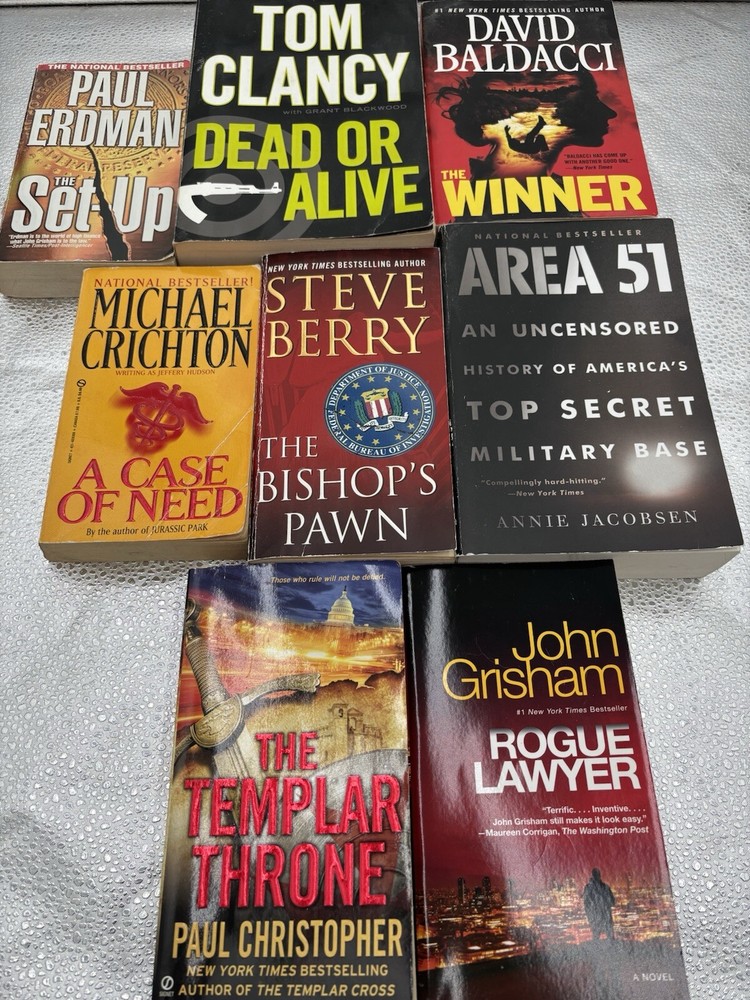 Lot Of 8 Various  Paperbacks Tom Clancy Grisham Baldacci  Crichton Military