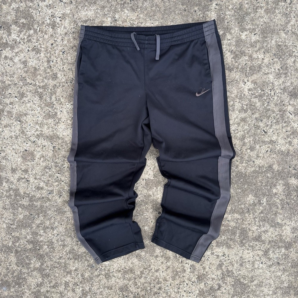 Nike black and brown track pantsSize: M
