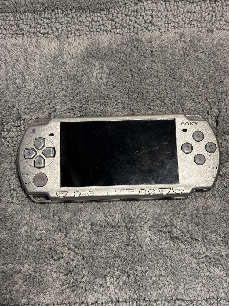 Sony PSP-2001 Handheld Game System Silver FOR PARTS OR REPAIR