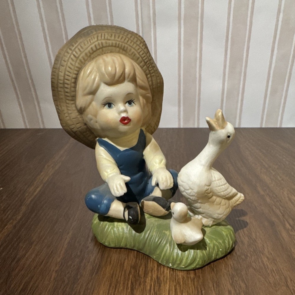 Hand Painted Ceramic Child with Goose Figurine, Painted Finish Multicolor
