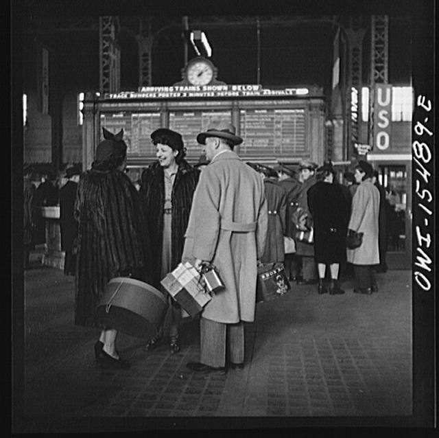 Chicago, Illinois. Waiting for trains in the train concourse at the Union