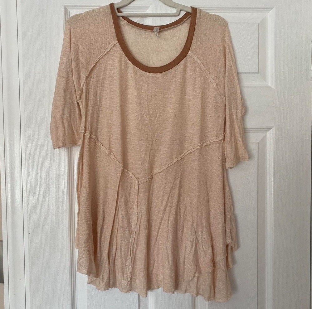 Free People Intimates Mesh Top Size M. Slightly sheer material, cream color.