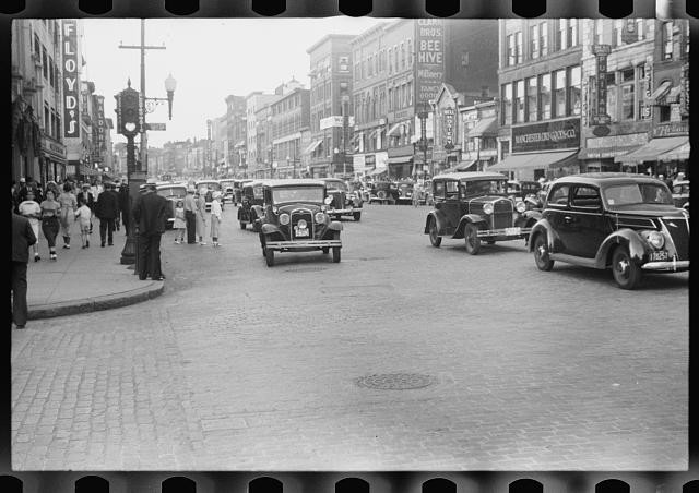 Manchester New Hampshire 1937 downtown street cars storefronts pedestrian scene