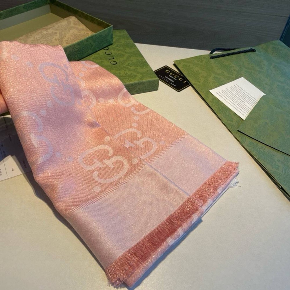 Luxury Gucci women's scarf in premium silk or wool