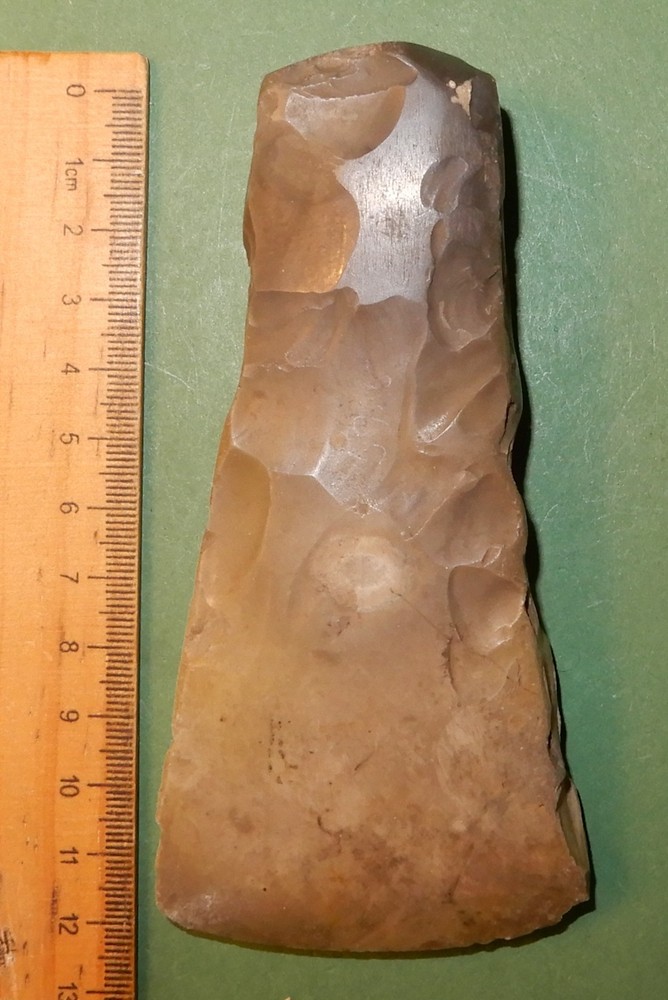 Polished thick-butted, broad-bladed flint axe. Danish Stoneage dating 1500 b.c