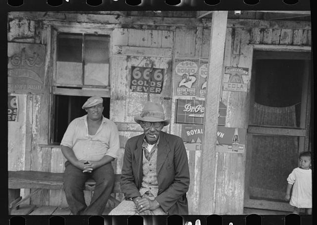 Photo:Jeanerette Louisiana 1938 Black Men Porch of Small Store