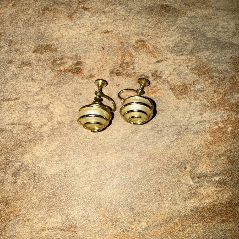 vintage Crown Trifari gold-tone faux pearl spiral clip-ons, likely from 1950s.