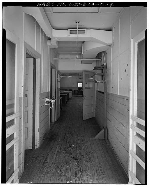 4. INTERIOR VIEW CORRIDOR, LOOKING WEST TOWARDS GUARD ROOM - Fort McCoy,