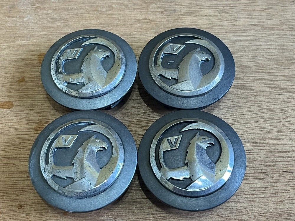 x4 Vauxhall Astra J Alloy Wheel Centre Caps Set Genuine