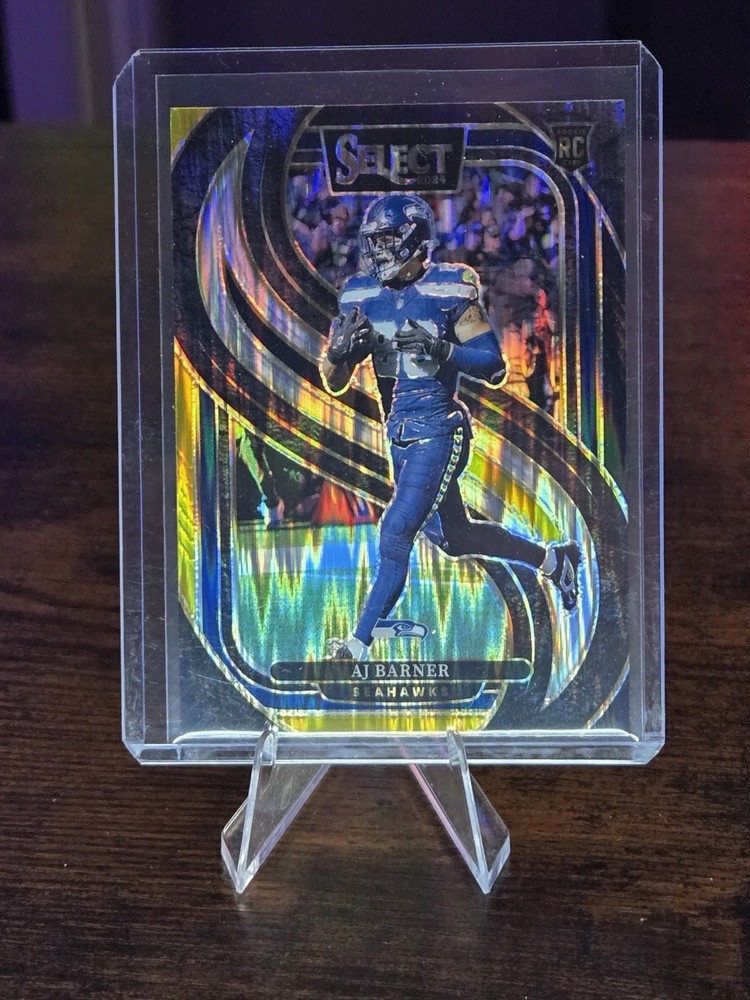 2024 Panini Select - Premier Level AJ Barner #103 Black & Gold Shock Prizm (RC)