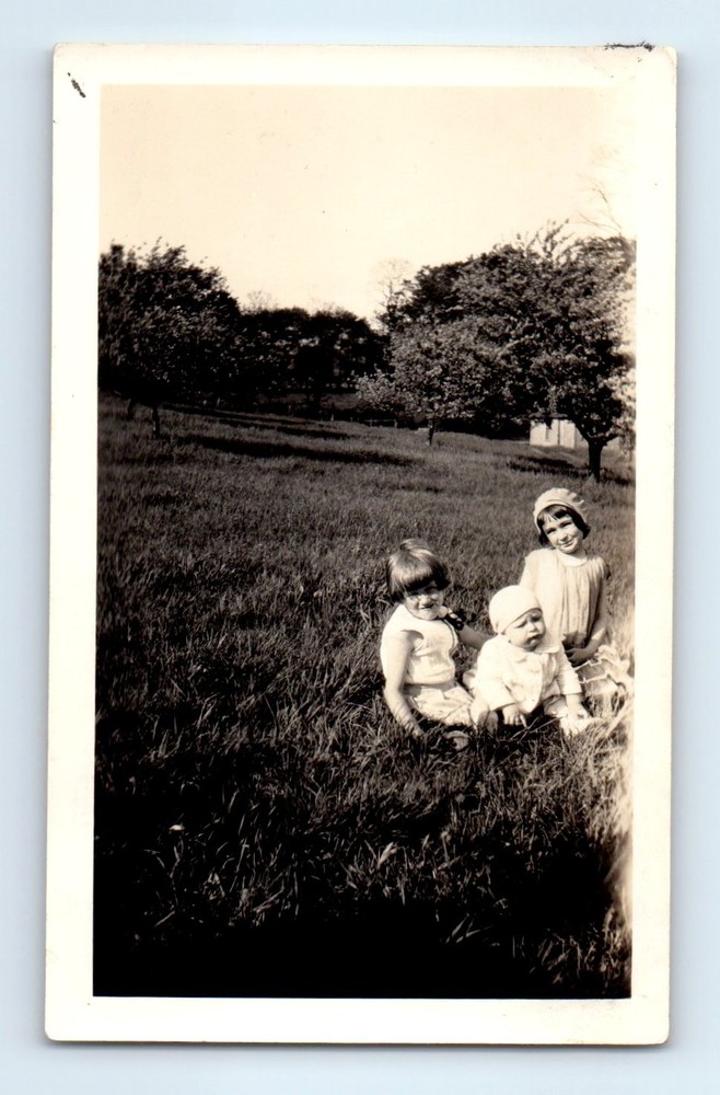 Old Vintage Photo GIRLS AND BABY SITTING IN FIELD MEADOW ANTIQUE SNAPSHOT