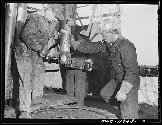 Photo:Andrews County Texas 1942 Oil Drill Bit Workers Rig Floor