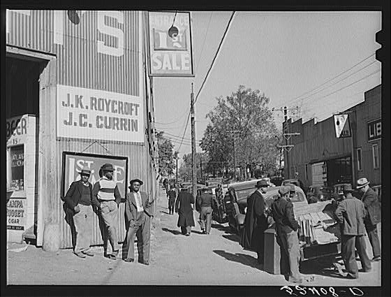Photo:Durham North Carolina 1930s street scene men storefront FSA photo