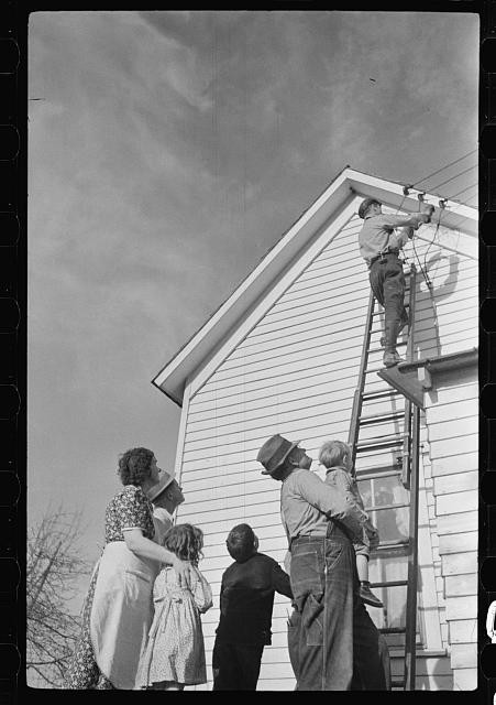 Photo:1930s House Wiring Family Watching Man on Ladder Signal Lines