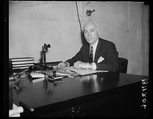 Photo:Portrait Man at Desk Office 1940s Black and White Photograph