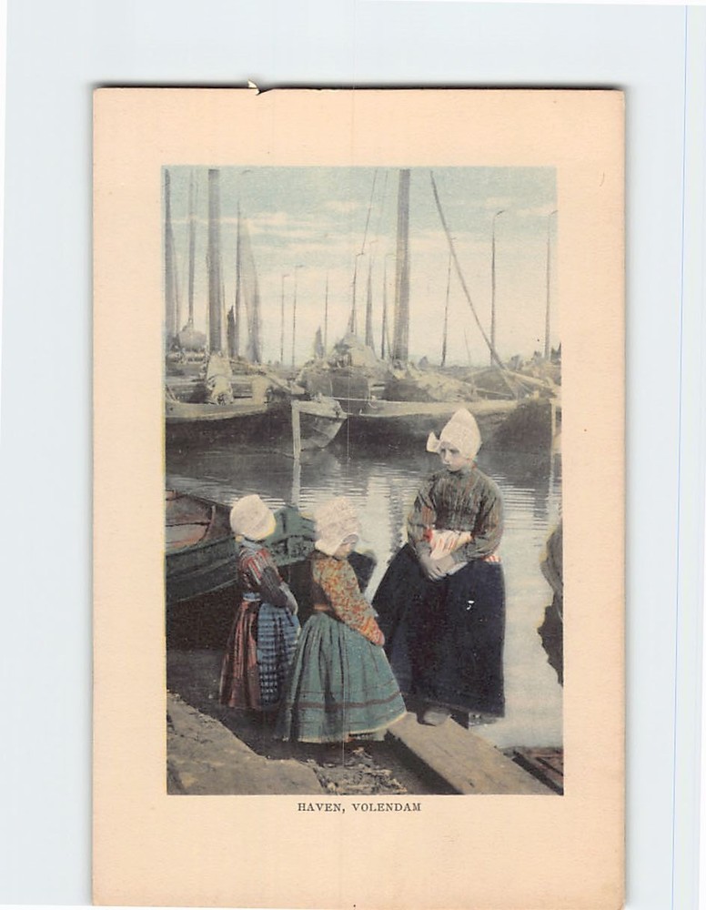 Postcard Girls in Traditional Wear in Haven Volendam Netherlands