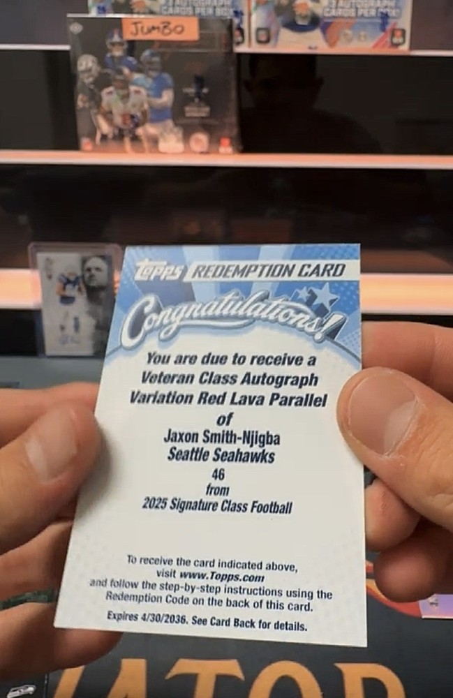 Topps 2025 Signature Class Jaxon Smith-Njigba Auto Redemption Red Lava /25