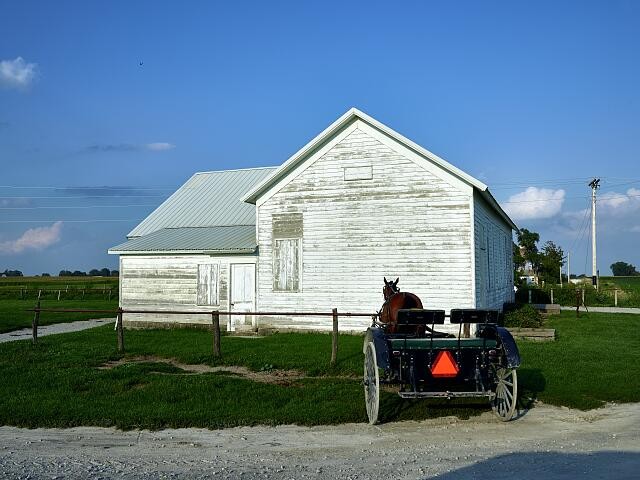 Photo:Kalona Iowa Amish Horse and Buggy 2016 Parked by White Barn