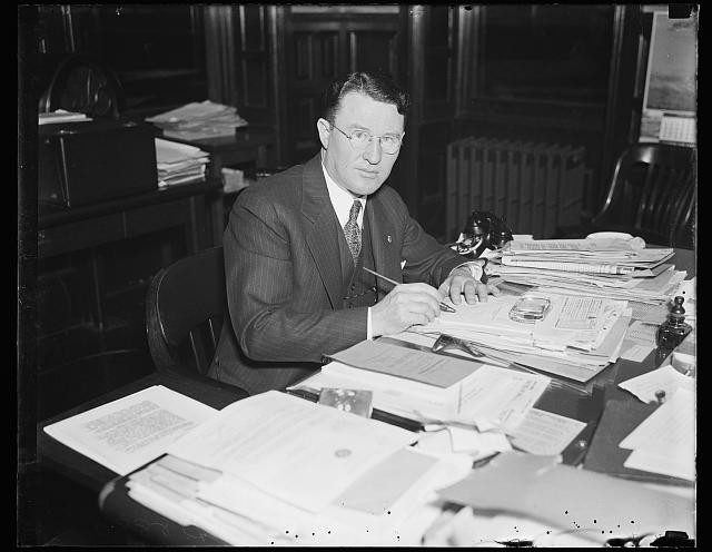 Photo:Office Portrait Man at Desk 1935 1936 Papers and Documents