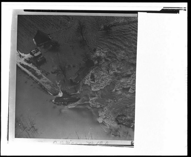 Photo:1940s Aerial View Flooded Riverbank House Coastline