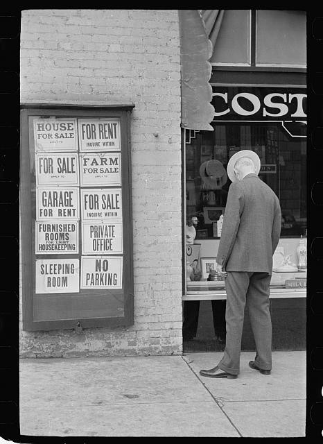 Photo:1930s Storefront House for Sale For Rent Signs Man Window Shopping